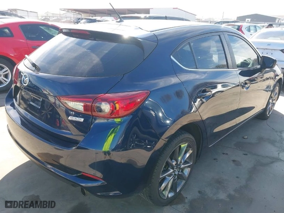 2018 Mazda Mazda3 5-Door Touring with VIN 3MZBN1L37JM272319, listed as a IAAI auction lot 41387550 with 21,376 mi miles. Bid and sale history available at carsss.com. Image 4.