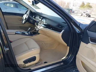 2014 BMW 5 Series 528i xDrive with VIN WBA5A7C54ED616297, listed as a IAAI auction lot 41877809 with 147,874 mi miles and . Bid and sale history available at DreamBid. Image 5.