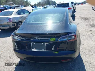 2022 Tesla Model 3 Long Range with VIN 5YJ3E1EB3NF104313, listed as a IAAI auction lot 41832803 with 39,061 mi miles and . Bid and sale history available at DreamBid. Image 16.