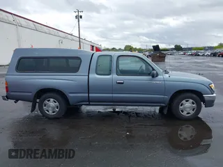 1997 Toyota Tacoma with VIN 4TAVL52N9VZ311363, listed as a IAAI auction lot 41939174 with 129,116 mi miles. Bid and sale history available at carsss.com. Image 12.
