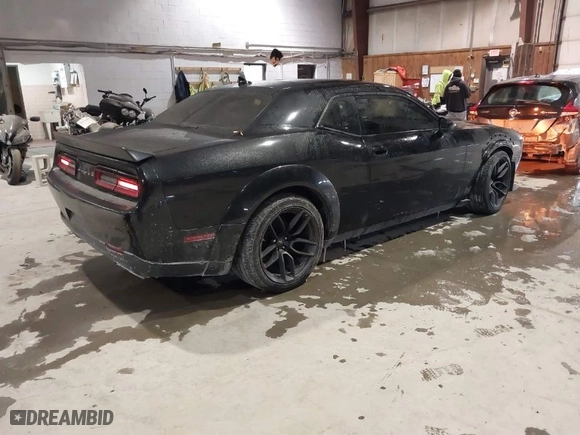 2019 Dodge Challenger R/T Scat Pack with VIN 2C3CDZFJ4KH671633, listed as a IAAI auction lot 41140929 with 45,988 mi miles. Bid and sale history available at carsss.com. Image 4.