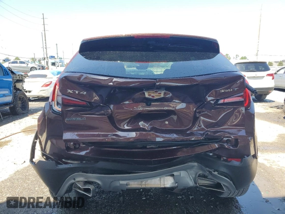 2022 Cadillac XT4 FWD Premium Luxury with VIN 1GYFZCR48NF123518, listed as a Copart auction lot 51969915 with 11,461 mi miles and Non repairable. Bid and sale history available at DreamBid. Image 6.