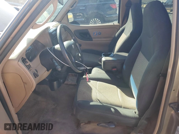 2003 Ford Ranger XL with VIN 1FTYR10D53PA62295, listed as a Copart auction lot 49323375 with 214,131 mi miles and Salvage Title. Bid and sale history available at DreamBid. Image 7.