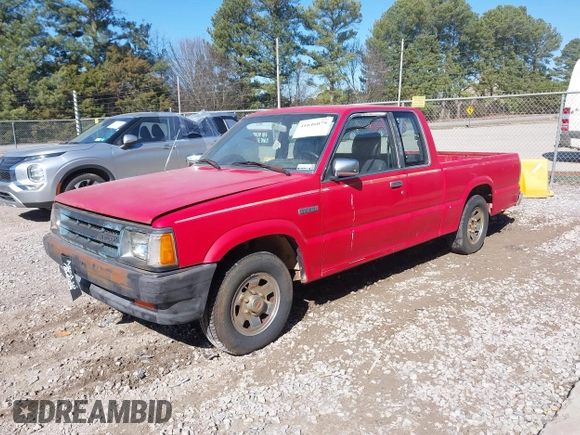 1991 Mazda B-Series Truck with VIN JM2UF3130M0121445, listed as a IAAI auction lot 41646079 with 271,494 mi miles and . Bid and sale history available at DreamBid. Image 2.