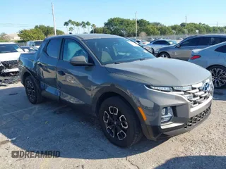 2022 Hyundai Santa Cruz SE z VIN 5NTJA4AE1NH008896, wystawiony jako IAAI lot #41444400 z przebiegiem 23 547 mil mil oraz . Historia ofert i sprzedaży dostępna na DreamBid. Obrazek 1.