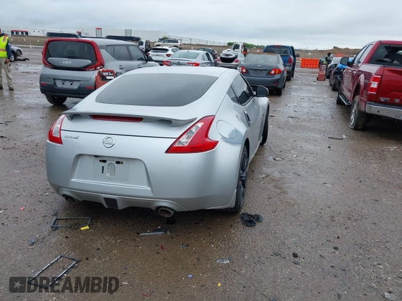 2010 Nissan 370Z Touring with VIN JN1AZ4EH9AM503264, listed as a IAAI auction lot 42180901 with Not provided miles and . Bid and sale history available at DreamBid. Image 4.
