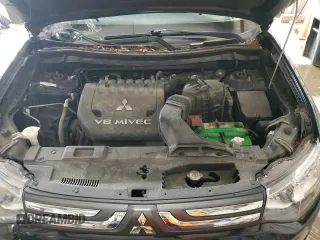 2014 Mitsubishi Outlander GT z VIN JA4JZ4AX2EZ013911, wystawiony jako Copart lot #60603715 z przebiegiem 78 547 mil mil oraz Szkoda całkowita • Salvage title. Historia ofert i sprzedaży dostępna na DreamBid. Obrazek 12.