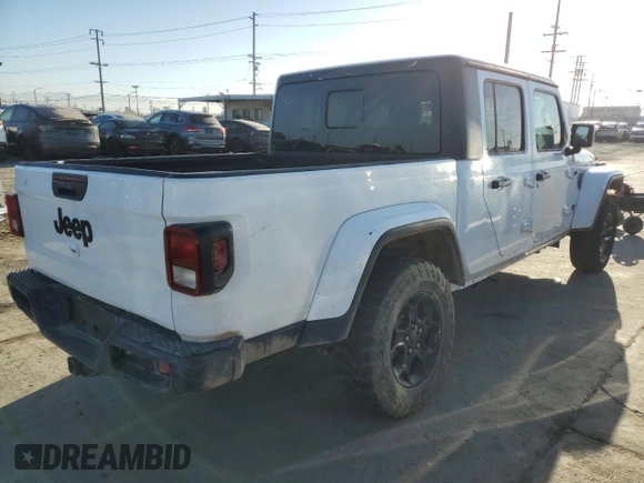 2023 Jeep Gladiator Sport S with VIN 1C6HJTAG4PL528847, listed as a Copart auction lot 64470375 with 36,177 mi miles and Salvage title. Bid and sale history available at DreamBid. Image 3.