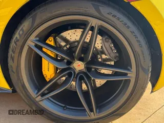2018 McLaren 570S z VIN SBM13FAA2JW004563, wystawiony jako Copart lot #51371545 z przebiegiem 20 602 mil mil oraz Tytuł czysty. Historia ofert i sprzedaży dostępna na DreamBid. Obrazek 6.