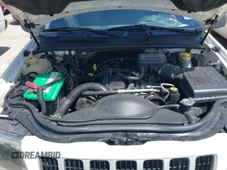 2004 Jeep Grand Cherokee Laredo z VIN 1J4GX48S74C152542, wystawiony jako IAAI lot #42350507 z przebiegiem 176 366 mil mil oraz . Historia ofert i sprzedaży dostępna na DreamBid. Obrazek 10.