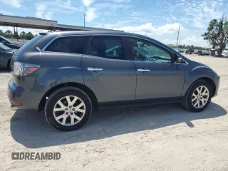 2011 Mazda CX-7 S Grand Touring z VIN JM3ER4D33B0355181, wystawiony jako Copart lot #69687474 z przebiegiem 223 622 mil mil oraz Nie do naprawy • Non repairable. Historia ofert i sprzedaży dostępna na DreamBid. Obrazek 3.