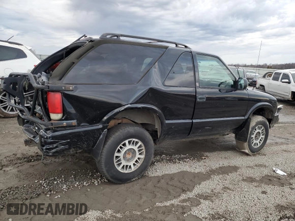 2000 Chevrolet Blazer LS z VIN 1GNCT18W1YK151830, wystawiony jako Copart lot #88799235 z przebiegiem 190 019 mil mil oraz Nie do naprawy • Non repairable. Historia ofert i sprzedaży dostępna na DreamBid. Obrazek 3.