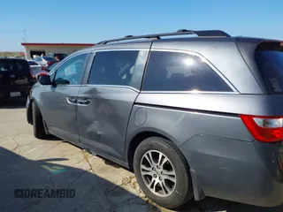 2011 Honda Odyssey EX-L with VIN 5FNRL5H6XBB073482, listed as a IAAI auction lot 42090463 with 213,061 mi miles and . Bid and sale history available at carsss.com. Image 14.