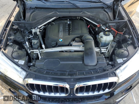 2016 BMW X5 xDrive35i z VIN 5UXKR0C53G0U07941, wystawiony jako Copart lot #56036645 z przebiegiem 108 670 mil mil oraz Szkoda całkowita • Salvage title. Historia ofert i sprzedaży dostępna na DreamBid. Obrazek 12.