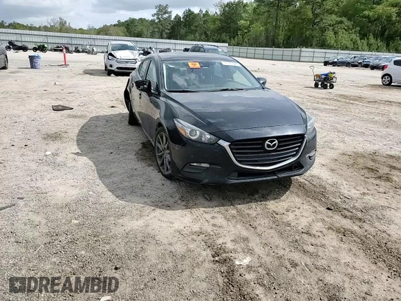 2018 Mazda 3 Touring z VIN 3MZBN1V3XJM268911, wystawiony jako Copart lot #51731825 z przebiegiem 151 921 mil mil oraz Szkoda całkowita • Salvage title. Historia ofert i sprzedaży dostępna na DreamBid. Obrazek 10.