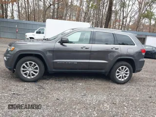 2021 Jeep Grand Cherokee Laredo X with VIN 1C4RJFAG6MC703691, listed as a IAAI auction lot 41655340 with 53,300 mi miles and . Bid and sale history available at DreamBid. Image 14.