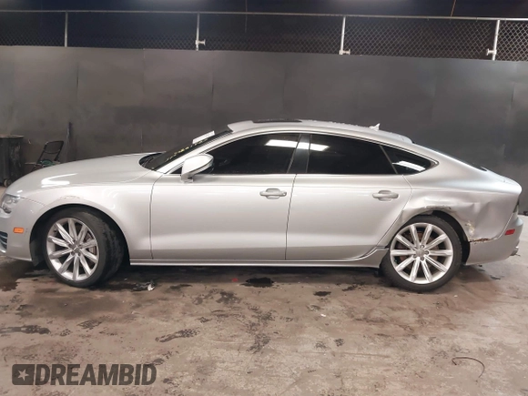 2012 Audi A7 z VIN WAUWGCFC2CN091270, wystawiony jako IAAI lot #41261927 z przebiegiem 109 756 mil mil oraz . Historia ofert i sprzedaży dostępna na DreamBid. Obrazek 14.