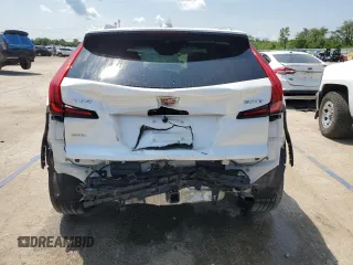 2024 Cadillac XT4 AWD Premium Luxury z VIN 1GYFZDR45RF159744, wystawiony jako Copart lot #62068595 z przebiegiem 14 631 mil mil oraz Szkoda całkowita • Salvage title. Historia ofert i sprzedaży dostępna na DreamBid. Obrazek 6.