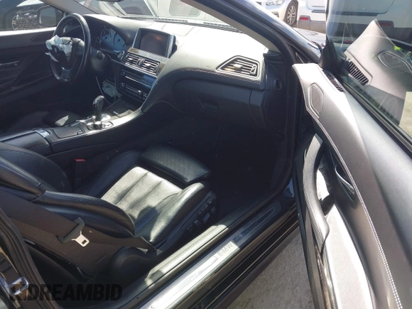 2013 BMW 6 Series 650i with VIN WBAYM9C57DDW20178, listed as a IAAI auction lot 41933561 with 72,886 mi miles and . Bid and sale history available at carsss.com. Image 5.