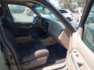 2002 Ford Explorer Sport Trac Value with VIN 1FMZU67E72UB55460, listed as a IAAI auction lot 42677446 with 148,794 mi miles and . Bid and sale history available at DreamBid. Image 5.