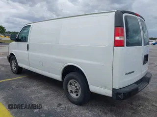 2014 Chevrolet Express Cargo Van with VIN 1GCWGFFA2E1111014, listed as a IAAI auction lot 42190194 with 97,172 mi miles. Bid and sale history available at carsss.com. Image 3.