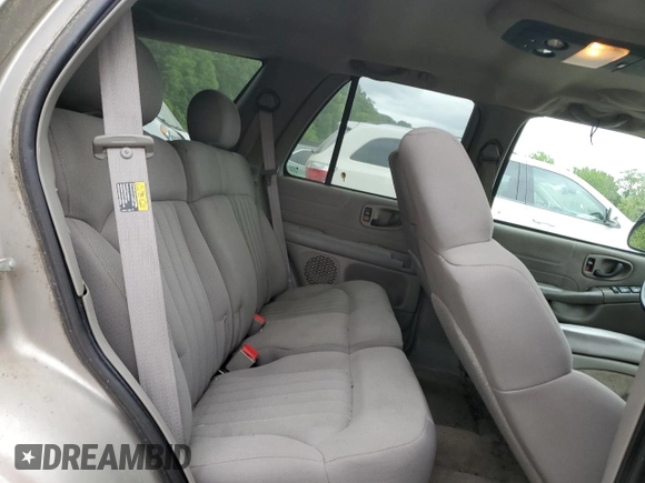 2004 Chevrolet Blazer LS z VIN 1GNDT13X84K162807, wystawiony jako Copart lot #57154205 z przebiegiem 82 732 mil mil oraz Czysty tytuł • Clean title. Historia ofert i sprzedaży dostępna na DreamBid. Obrazek 11.