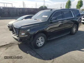2018 Chevrolet Tahoe LS with VIN 1GNSCAKC9JR201994, listed as a Copart auction lot 53100735 with 182,460 mi miles and Salvage title. Bid and sale history available at DreamBid. Image 1.
