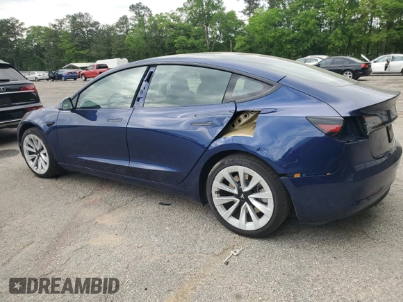 2023 Tesla Model 3 with VIN 5YJ3E1EA5PF695318, listed as a Copart auction lot 53832935 with 28,863 mi miles and Salvage title. Bid and sale history available at DreamBid. Image 2.