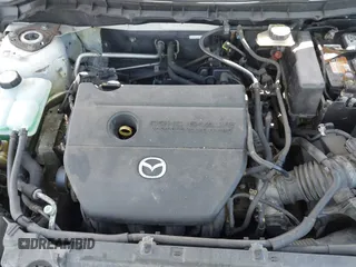 2010 Mazda Mazda3 i Touring with VIN JM1BL1SF1A1169933, listed as a IAAI auction lot 41832033 with 999,999 mi miles. Bid and sale history available at carsss.com. Image 10.