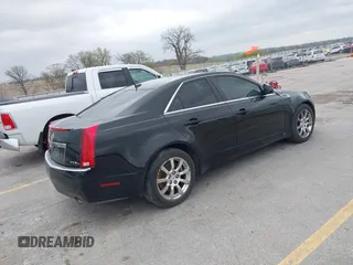 2008 Cadillac CTS AWD w/1SA with VIN 1G6DG577080180639, listed as a IAAI auction lot 42128238 with 141,133 mi miles. Bid and sale history available at carsss.com. Image 4.