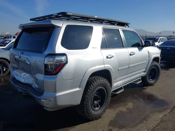 2016 Toyota 4Runner Limited with VIN JTEBU5JR1G5361379, listed as a IAAI auction lot 41186843 with 162,714 mi miles. Bid and sale history available at carsss.com. Image 4.