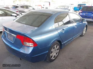 2010 Honda Civic Sdn LX with VIN 2HGFA1F50AH581076, listed as a IAAI auction lot 41945819 with 154,636 mi miles. Bid and sale history available at carsss.com. Image 4.