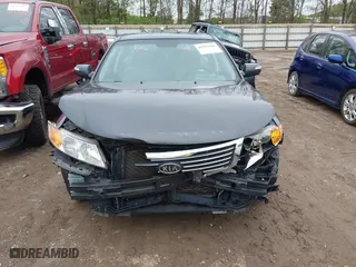 2010 Kia Optima LX with VIN KNAGG4A82A5394267, listed as a IAAI auction lot 41955386 with 134,912 mi miles. Bid and sale history available at carsss.com. Image 6.
