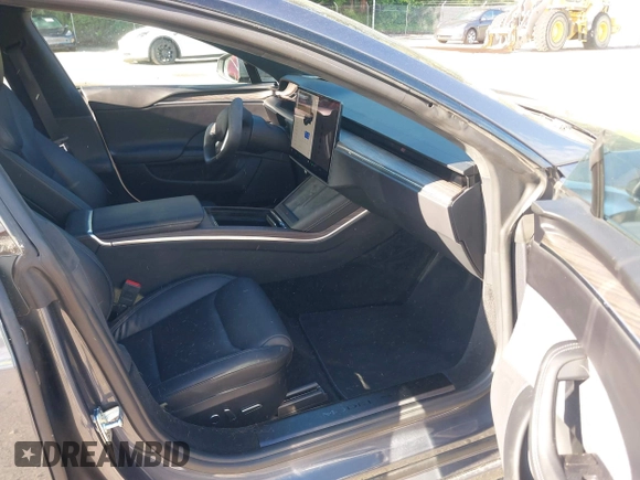 2022 Tesla Model S with VIN 5YJSA1E57NF479056, listed as a IAAI auction lot 42091009 with 78,272 mi miles and . Bid and sale history available at DreamBid. Image 5.