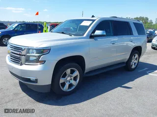 2015 Chevrolet Tahoe LTZ with VIN 1GNSCCKC3FR202934, listed as a IAAI auction lot 41995474 with 258,186 mi miles. Bid and sale history available at carsss.com. Image 19.