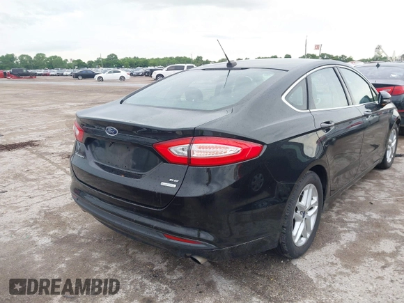 2015 Ford Fusion SE with VIN 1FA6P0HD9F5113069, listed as a IAAI auction lot 42126855 with 122,969 mi miles. Bid and sale history available at carsss.com. Image 4.