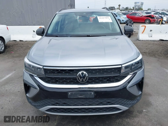2024 Volkswagen Taos S z VIN 3VV5X7B26RM037123, wystawiony jako IAAI lot #42447853 z przebiegiem 32 395 mil mil oraz . Historia ofert i sprzedaży dostępna na DreamBid. Obrazek 13.