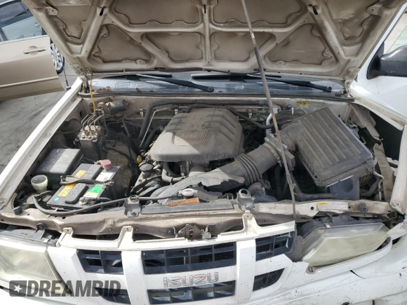 2004 Isuzu Rodeo S z VIN 4S2CK58W644300660, wystawiony jako Copart lot #54633785 z przebiegiem 375 845 mil mil oraz Szkoda całkowita • Salvage title. Historia ofert i sprzedaży dostępna na DreamBid. Obrazek 12.