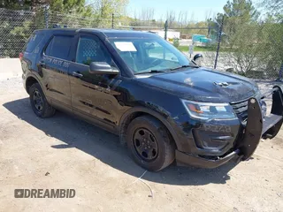 2018 Ford Police Interceptor Utility z VIN 1FM5K8AR1JGC18738, wystawiony jako IAAI lot #42234782 z przebiegiem 87 398 mil mil oraz . Historia ofert i sprzedaży dostępna na DreamBid. Obrazek 1.