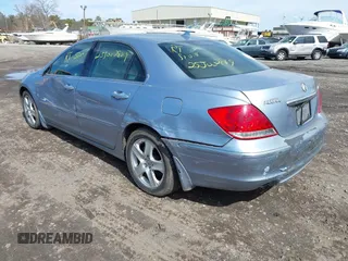 2005 Acura RL with VIN JH4KB16575C000447, listed as a IAAI auction lot 41832042 with 999,999 mi miles. Bid and sale history available at carsss.com. Image 3.