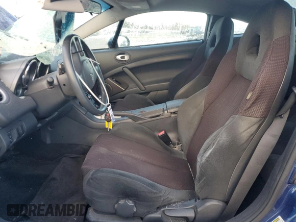 2009 Mitsubishi Eclipse GS z VIN 4A3AK24F99E041989, wystawiony jako Copart lot #88069855 z przebiegiem 106 395 mil mil oraz Szkoda całkowita • Salvage title. Historia ofert i sprzedaży dostępna na DreamBid. Obrazek 7.