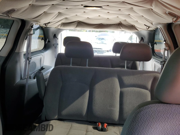 2007 Dodge Caravan SE z VIN 1D4GP25E97B222497, wystawiony jako Copart lot #57701925 z przebiegiem 122 076 mil mil oraz Czysty tytuł • Clean title. Historia ofert i sprzedaży dostępna na DreamBid. Obrazek 10.