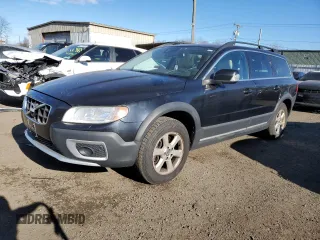 2012 Volvo XC70 3.2L z VIN YV4940BZ1C1141193, wystawiony jako Copart lot #88592985 z przebiegiem 203 487 mil mil oraz Czysty tytuł • Clean title. Historia ofert i sprzedaży dostępna na DreamBid. Obrazek 1.
