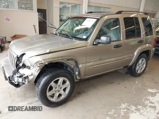 2003 Jeep Liberty Limited with VIN 1J4GK58K63W608970, listed as a IAAI auction lot 41581379 with 220,610 mi miles and . Bid and sale history available at carsss.com. Image 21.