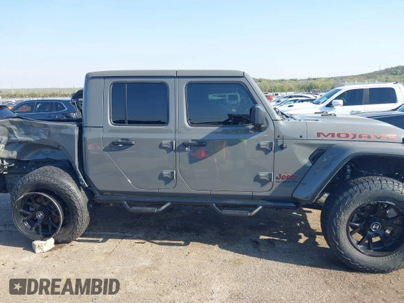 2022 Jeep Gladiator Mojave with VIN 1C6JJTEGXNL155838, listed as a IAAI auction lot 41968917 with 54,495 mi miles and . Bid and sale history available at DreamBid. Image 14.