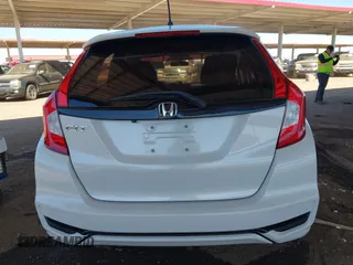 2020 Honda Fit LX z VIN 3HGGK5H45LM717560, wystawiony jako IAAI lot #41679343 z przebiegiem 47 134 mil mil oraz . Historia ofert i sprzedaży dostępna na DreamBid. Obrazek 16.