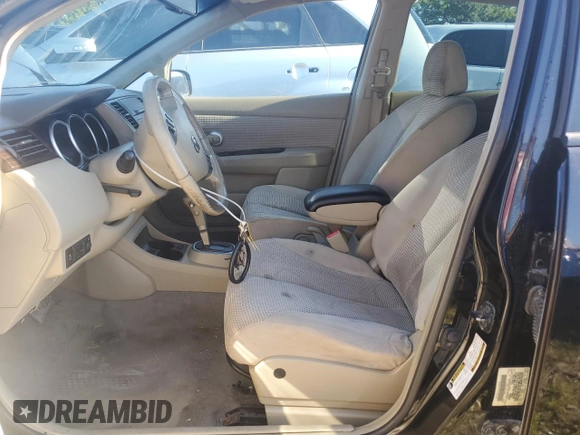 2012 Nissan Versa S with VIN 3N1BC1CP7CK205183, listed as a Copart auction lot 57873584 with 141,575 mi miles and Salvage Title. Bid and sale history available at carsss.com. Image 7.