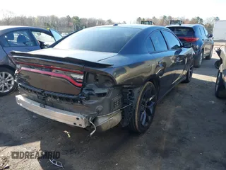 2020 Dodge Charger SXT with VIN 2C3CDXBG7LH101173, listed as a IAAI auction lot 41844489 with 157,773 mi miles. Bid and sale history available at carsss.com. Image 4.