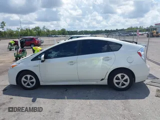 2015 Toyota Prius Four z VIN JTDKN3DU5F0463995, wystawiony jako IAAI lot #42189475 z przebiegiem 152 585 mil mil oraz . Historia ofert i sprzedaży dostępna na DreamBid. Obrazek 14.