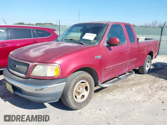 2000 Ford F-150 XL with VIN 1FTZX1725YNA94343, listed as a IAAI auction lot 41659358 with 295,337 mi miles. Bid and sale history available at carsss.com. Image 2.